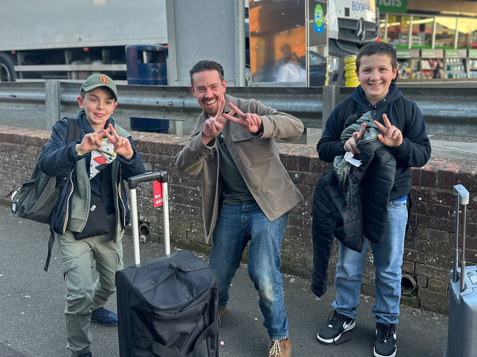 Students with their luggage meeting their host at Eden Park