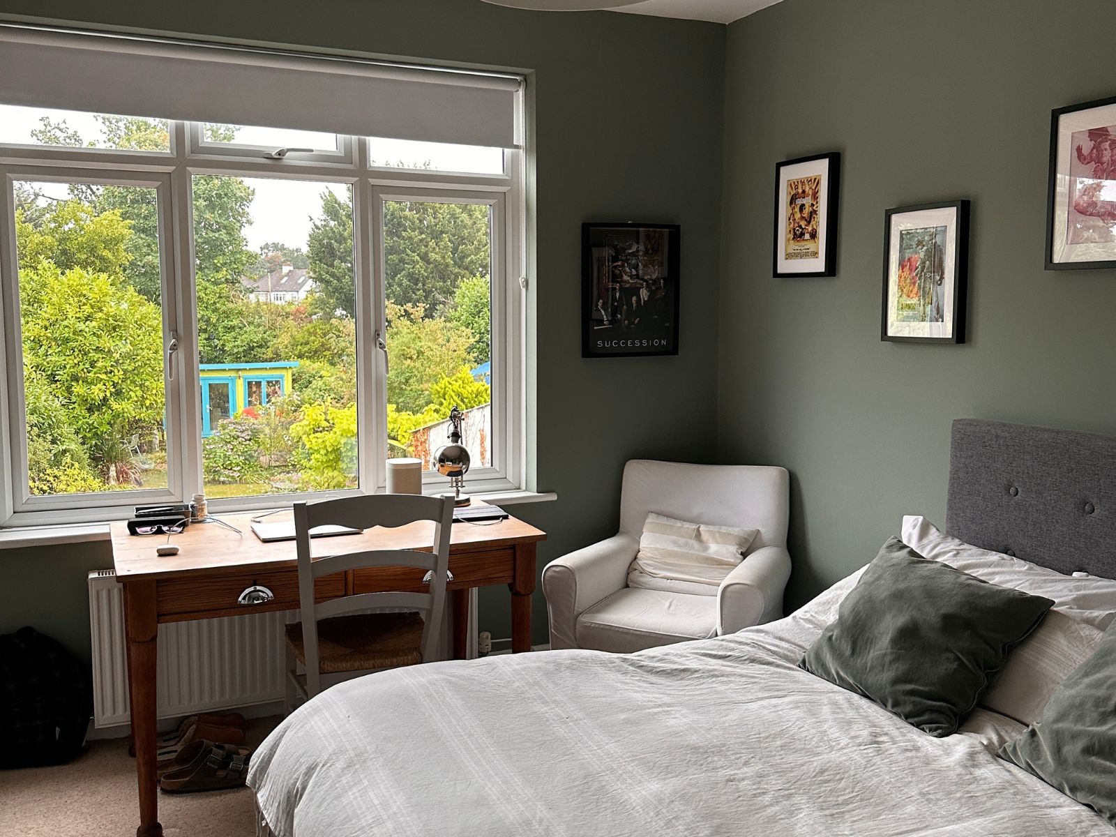 A bright student bedroom with a study desk in a West Wickham host home