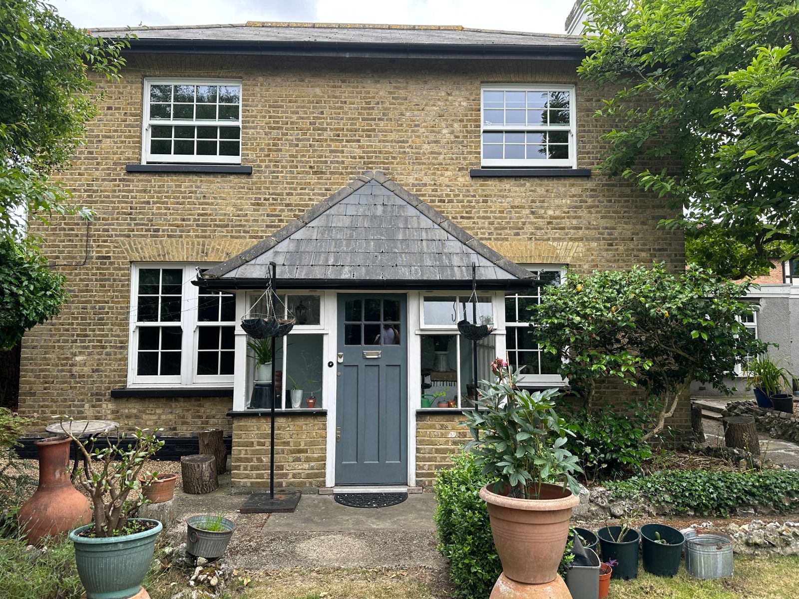 A Bromley host home with a planted front garden near Norman Park